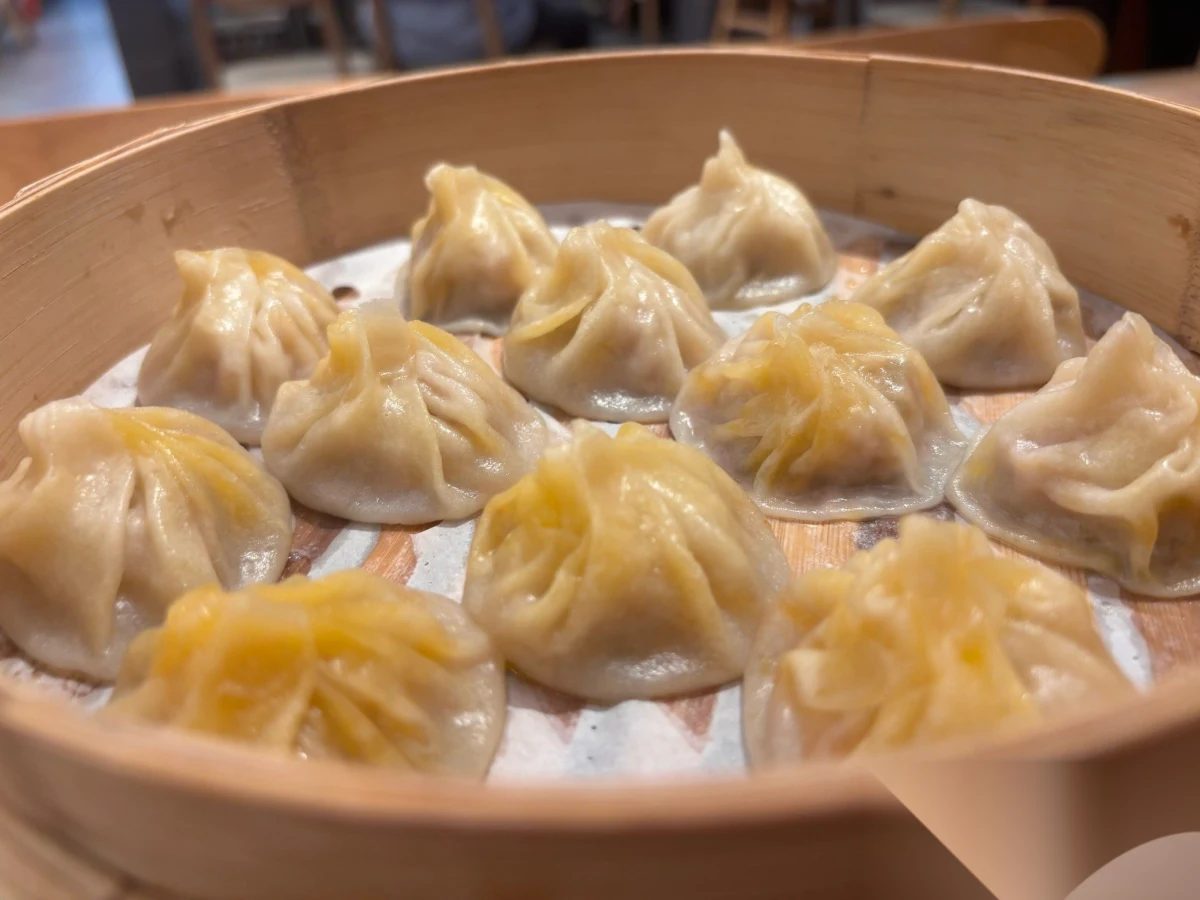 Steaming basket of crab soup dumplings