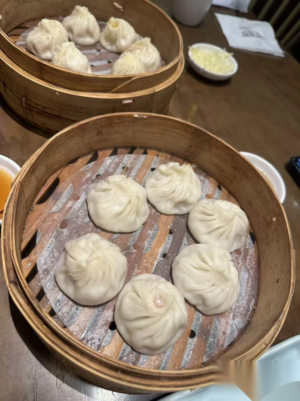 A bamboo basket of pork xiaolongbao