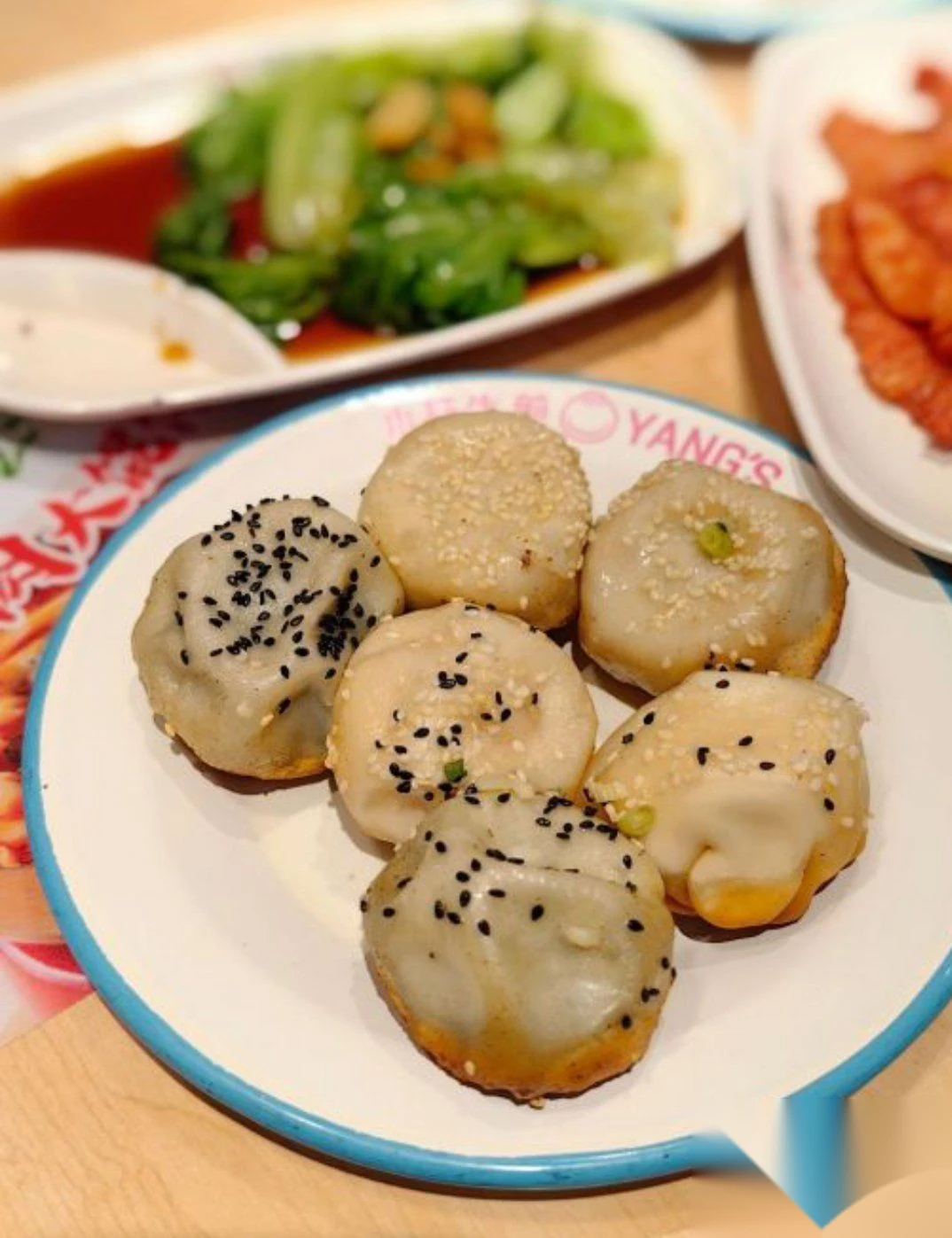 A plate of Yang's pan-fried pork buns